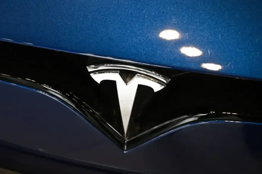 tesla badge