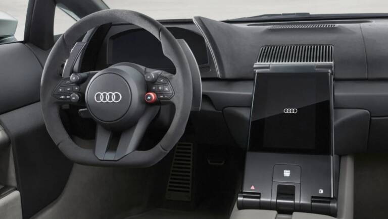 Audi ferma la corsa ai mega schermi: tornano tasti, manopole e plance più pulite